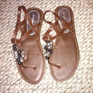 Brown Aeropostale embellished sandals.