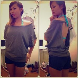 SOLD....Open shoulder and back metallic top!