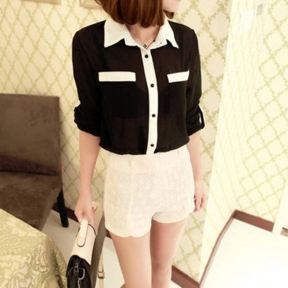 New black blouse with white button strip