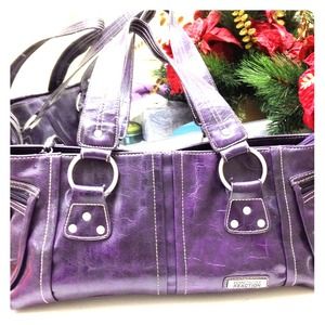 Purple Kenneth cole reaction handbag.