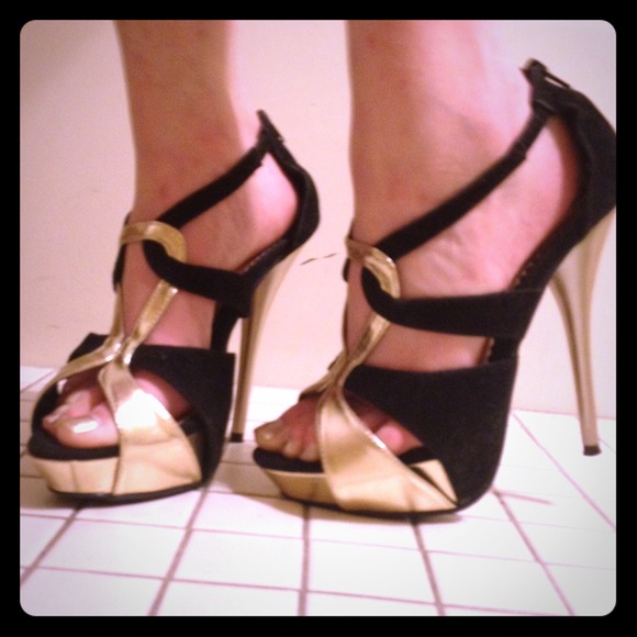 Gold and black heels
