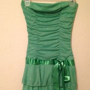 Short green sparkly strapless dress