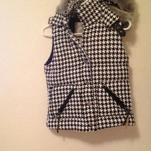 Black and white checkered vest.