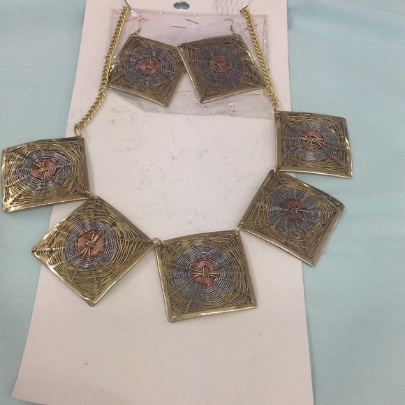 Gold, silver, and copper colored necklace set
