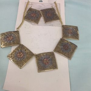 Gold, silver, and copper colored necklace set