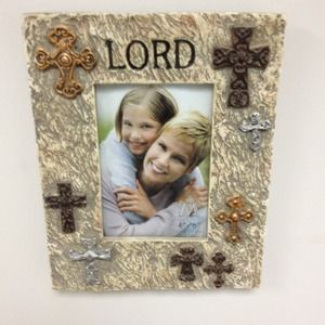 Beautiful unused pic frame with crosses.