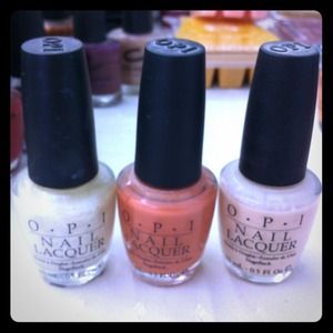 3 bottles of OPI nail color.