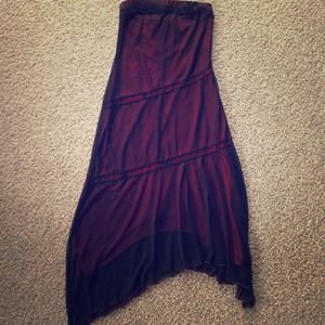 Dress-red with sheer black overlay. Never worn