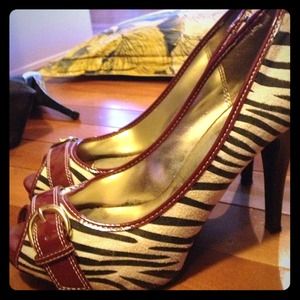 Zebra print heel with red faux leather detailing