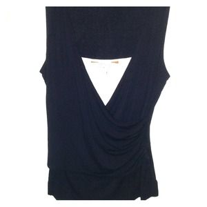 Wrap style sleeveless top.