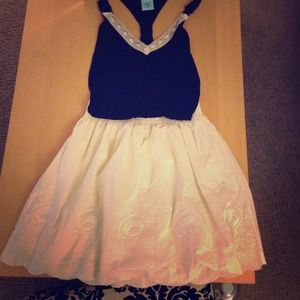 Cream colored skirt elastic band. Rose designs