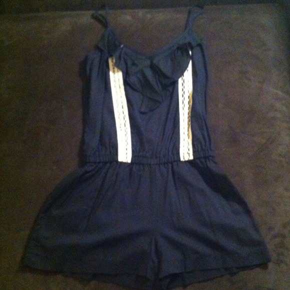 Black spaghetti strap romper with cream accents