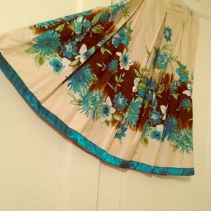 Pleated, high waisted or below-knee skirt