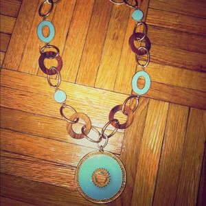 ****Turquoise pendant with gold and brown accents