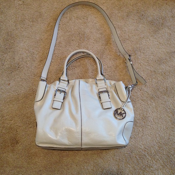 Authentic Michael Kors bone color bag.