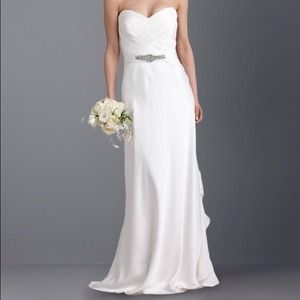 New with tags Silk ivory wedding/reception dress