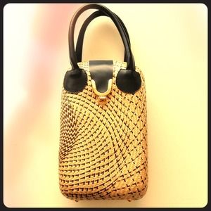 Elegant wicker and leather purse handbag