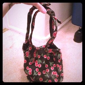 Cherry cloth shoulder bag.