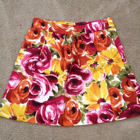 Sold  floral print skirt/never worn
