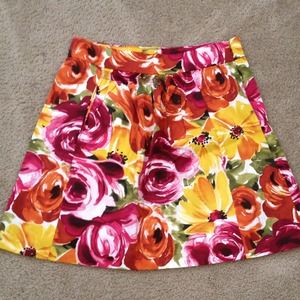 Sold  floral print skirt/never worn
