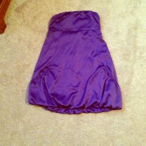 Purple silk strapless dress.