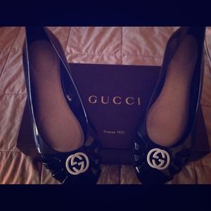 Authentic black Gucci marola wedges with white gg.