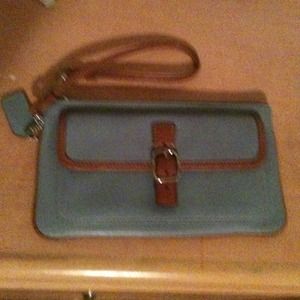 Coach blue and tan clutch