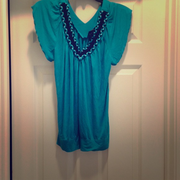 Size large. V neck turquoise dress top.