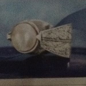 Pearl nestled ring, whole sizes., .925 silver