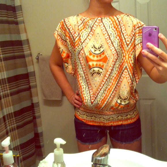 Orange tribal print shirt
