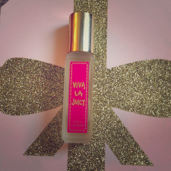 Sold Viva la juicy parfum roller ball .25 oz 7 ml.