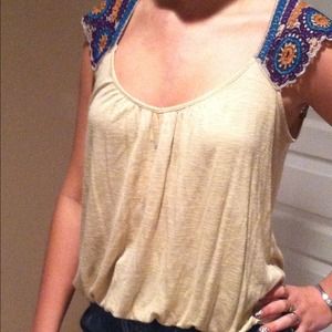 Cute shirt with crochet detail.  Size small