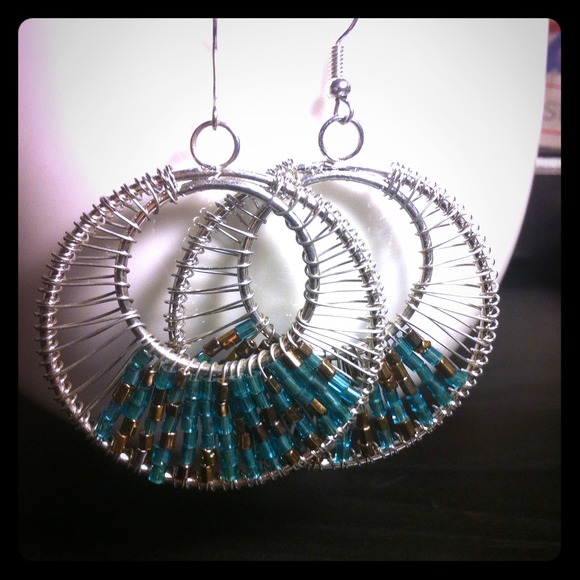 Peacock colored dangle earring