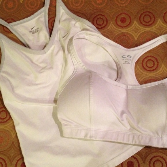 Two sports bras. One Champion 34c, one Nike Small.