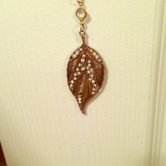 Long gold leaf necklace with gemstones