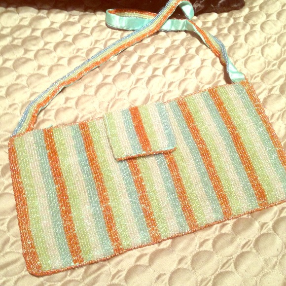 Beaded striped clutch with beaded strap