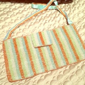 Beaded striped clutch with beaded strap