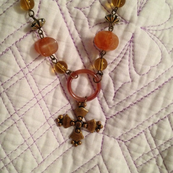 Cross necklace . Orange /good tones