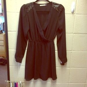 Black long sleeve dress with stud detailing