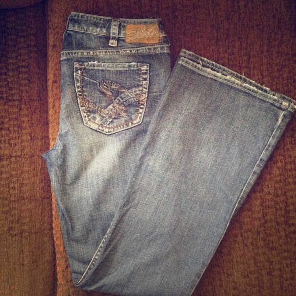 Silver Jeans Suki Flare size 32/33