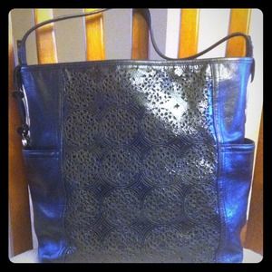 BRIGHTON Leather purse with silver accents.
