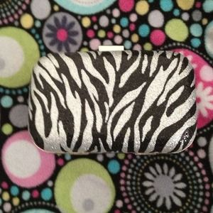 Zebra print glitter clutch
