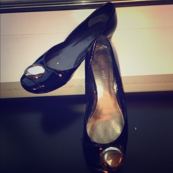 Nine West black patent leather flats.