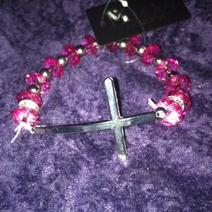 Side cross bracelet with pink beads