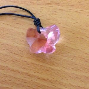Used pink butterfly Swarovski crystal necklace
