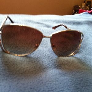 Brown and gold sun glasses perfect for summer..