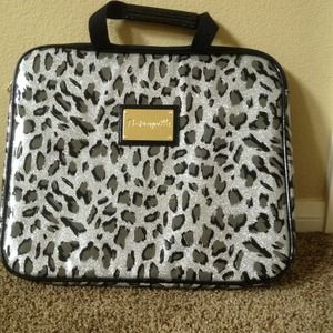 Betsey Johnson laptop carrier.