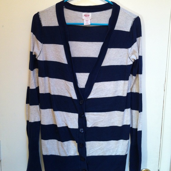 White and cream colored cardigan