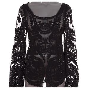 New Sheer shirt with cotton detail.