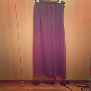 Long, lavender, polyester skirt.